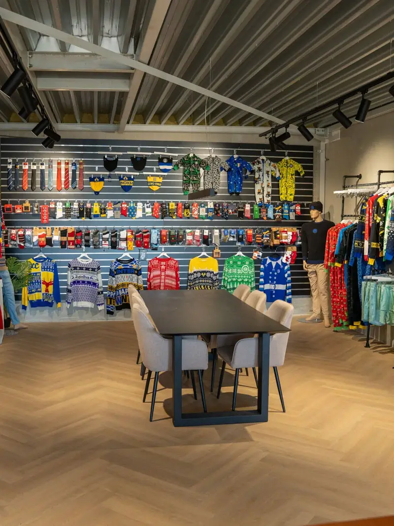 Custom clothing and promotional products displayed in the WIEBO International office